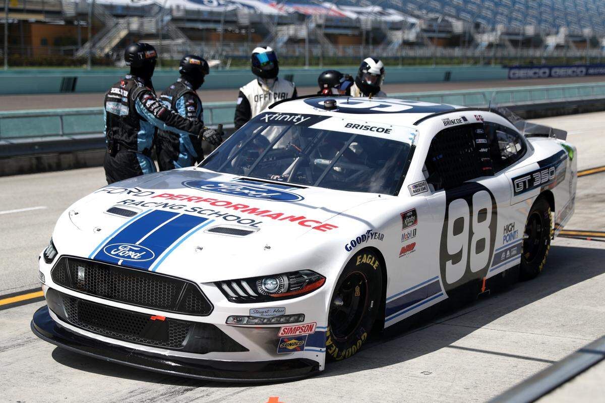 HOMESTEAD, FLORIDA - JUNE 13: Officials inspect Chase Briscoe, driver of the #98 Ford Performance Racing School Ford, during the NASCAR Xfinity Series Hooters 250 at Homestead-Miami Speedway on June 13, 2020 in Homestead, Florida. (Photo by Chris Graythen/Getty Images)