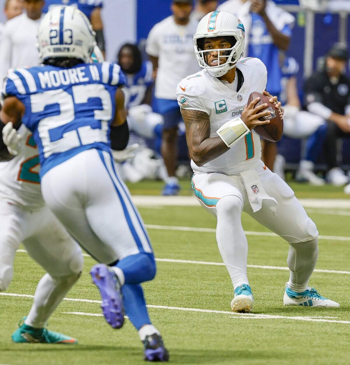 Miami Dolphins quarterback Tua Tagovailoa (1) sets up to pass during the second half of an NFL game against the Indianapolis Colts at Lucas Oil Stadium in Indianapolis on Sunday, September 7, 2025, in Indianapolis.