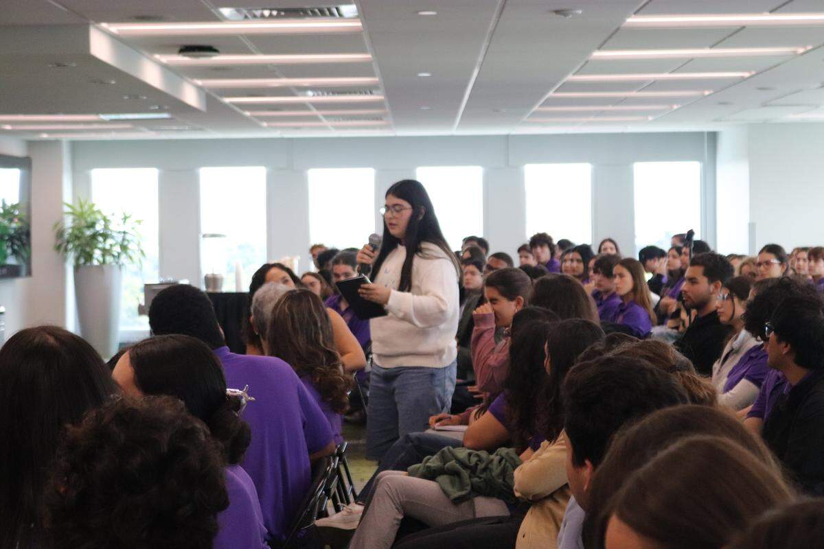 Miami-Dade College student Camilla Cardozo asks a question about religious acceptance during the panel “Interfaith Dialogue and Peace” as a part of MDC’s Changemaker Week 2025.