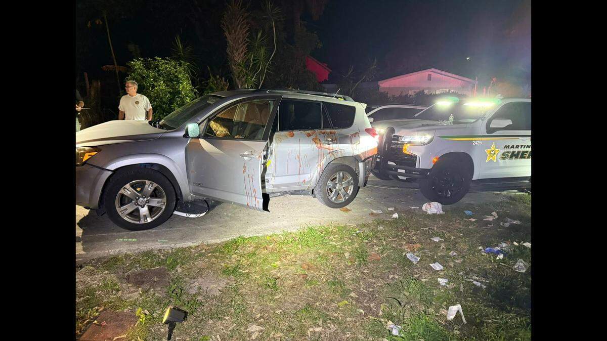 The attack happened June 25 at a home in Jensen Beach, Florida, and the suspect slashed his arms with a knife before deputies arrived, the Martin County Sheriff’s Office says.