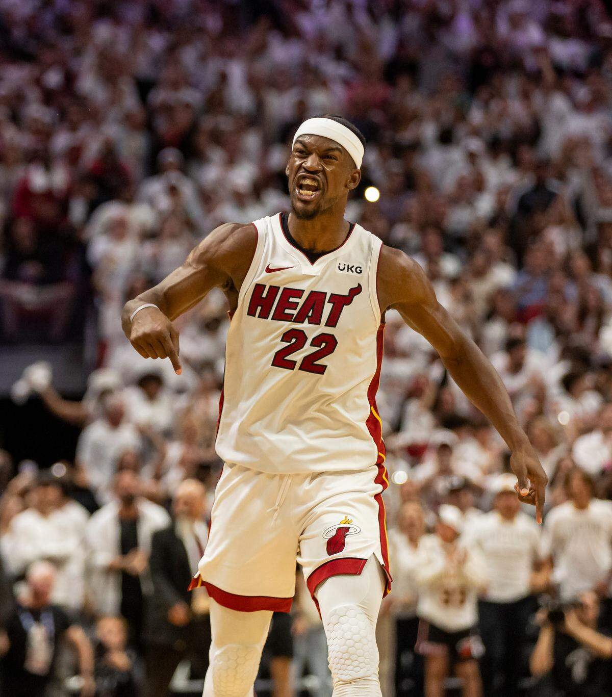 Miami Heat forward Jimmy Butler (22) reacts after scoring against the Milwaukee Bucks during the fourth quarter of Game 4 in the first-round NBA basketball playoff series at the Kaseya Center on Monday, April 24, 2023, in downtown Miami, Fla.