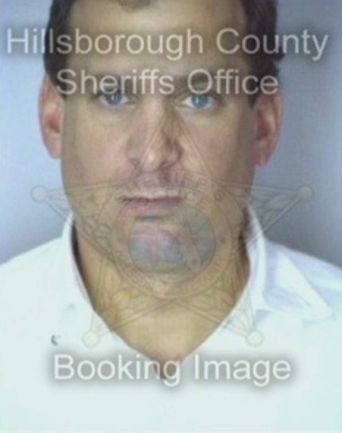 David H. Howard's booking photo.