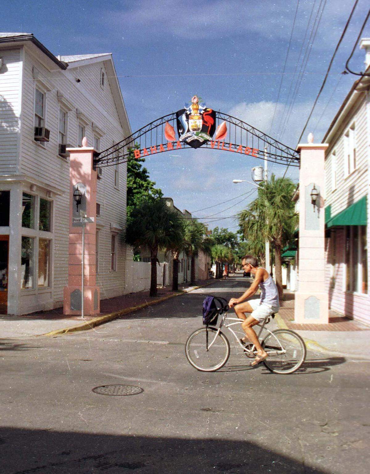 The arch marking the entrance to Bahama Village, at Petronia Street just off Duval Street, returned after more than a year. The arch was refurbished and the pillars holding it re-done.