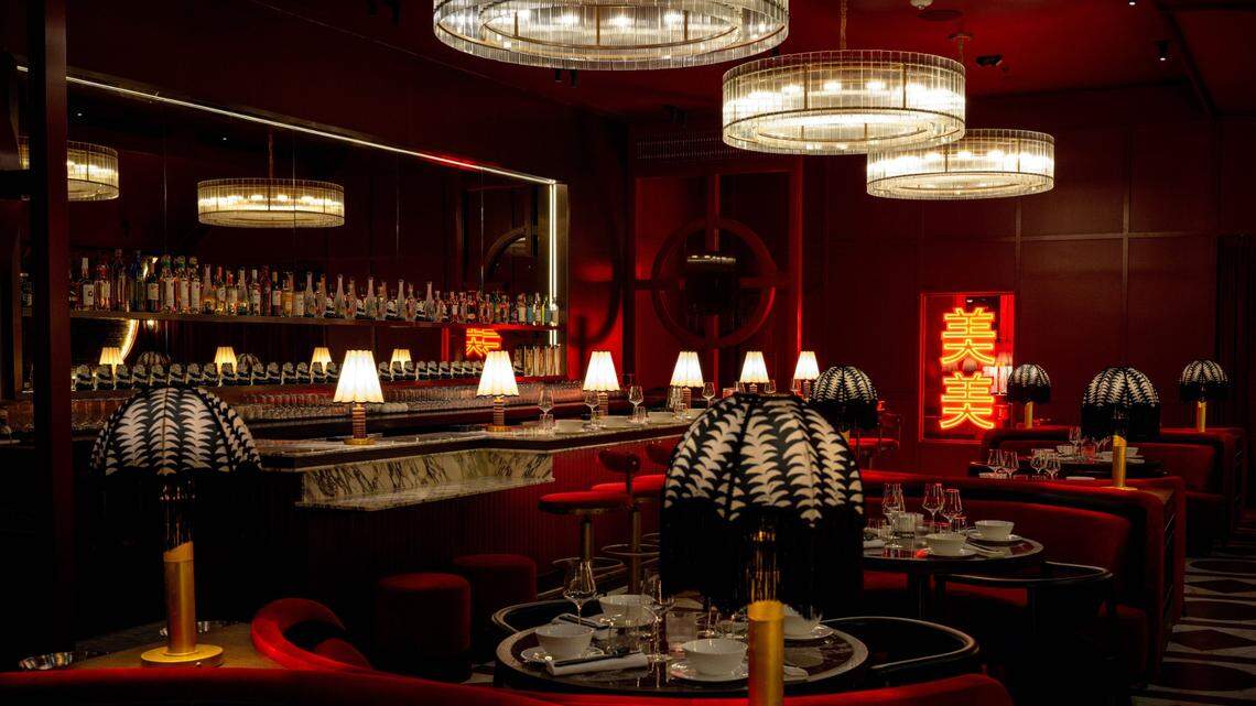 Dim lighting and red accents aim to produce an intimate atmosphere at the new Mimi’s Chinese in Miami Beach.