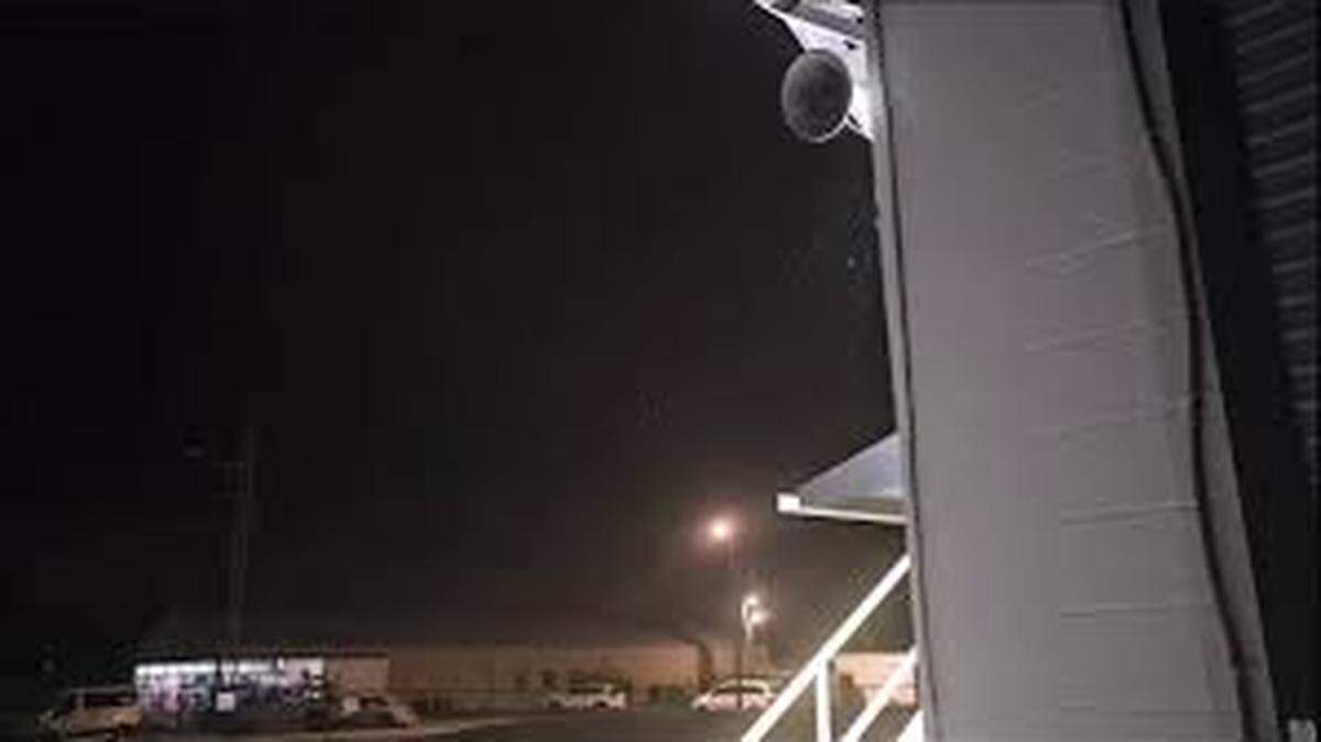 Faint snow flurries can be seen in this Sunday morning screen grab of a video shot by staff at the National Weather Service’s Tampa Bay office.