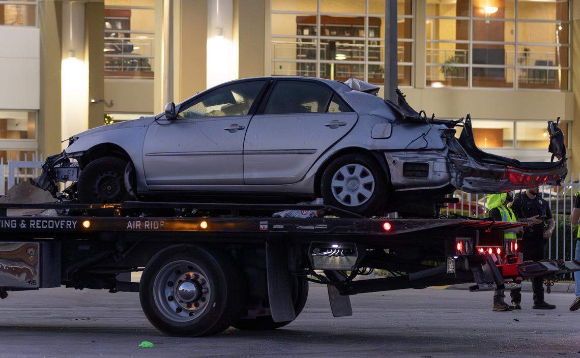 A vehicle involved in a collision with a Brightline train is removed from the crash scene near the 14100 block of Biscayne Boulevard in Miami on Wednesday, Nov. 19, 2025. One person was airlifted to a trauma center.