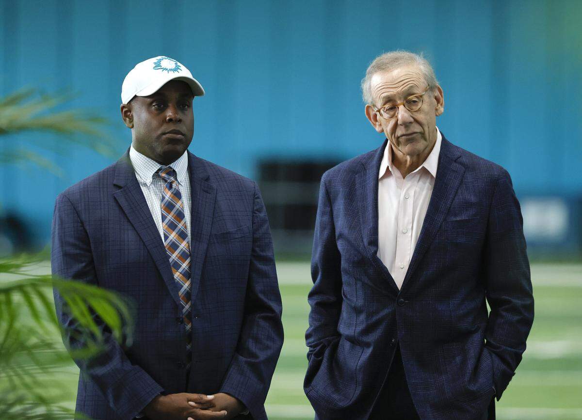Miami Dolphins general manager Chris Grier and Dolphins owner Stephen M. Ross listen to New Dolphins head coach Mike McDaniel during the introductory press conference at Baptist Health Training Complex in Hard Rock Stadium on Thursday, February 10, 2022 in Miami Gardens, Florida.