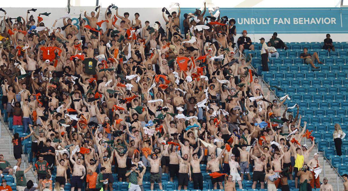 Miami Hurricanes fans show their support in the first half of an NCAA football game against the NC State Wolfpack at Hard Rock Stadium in Miami Gardens, Florida, on Saturday, November 15, 2025.