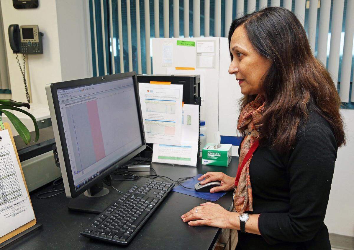 Parul Jayakar, a genetics and metabolic physician,  is director of Miami Genetic Laboratories at Nicklaus Children's Hospital in Miami. She is reviewing targeted sequencing data.