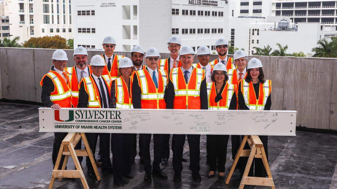 From left to right (front row): Stuart Miller, Joseph Echevarria, Jayne Malfitano, Dr. Stephen D. Nimer, Kenneth C. Griffin, Miami-Dade County Mayor Daniella Levine Cava, Laurie Silvers; (back row) Rudy Fernandez, Adam Carlin, Manny Kadre, Josh Friedman, Dr. Dipen J. Parekh, Daniel Krizek and Dr. Julio Frenk. Beam signing ceremony on 3/5/2024 at Sylvester’s Kenneth C. Griffin Cancer Research Building construction site.