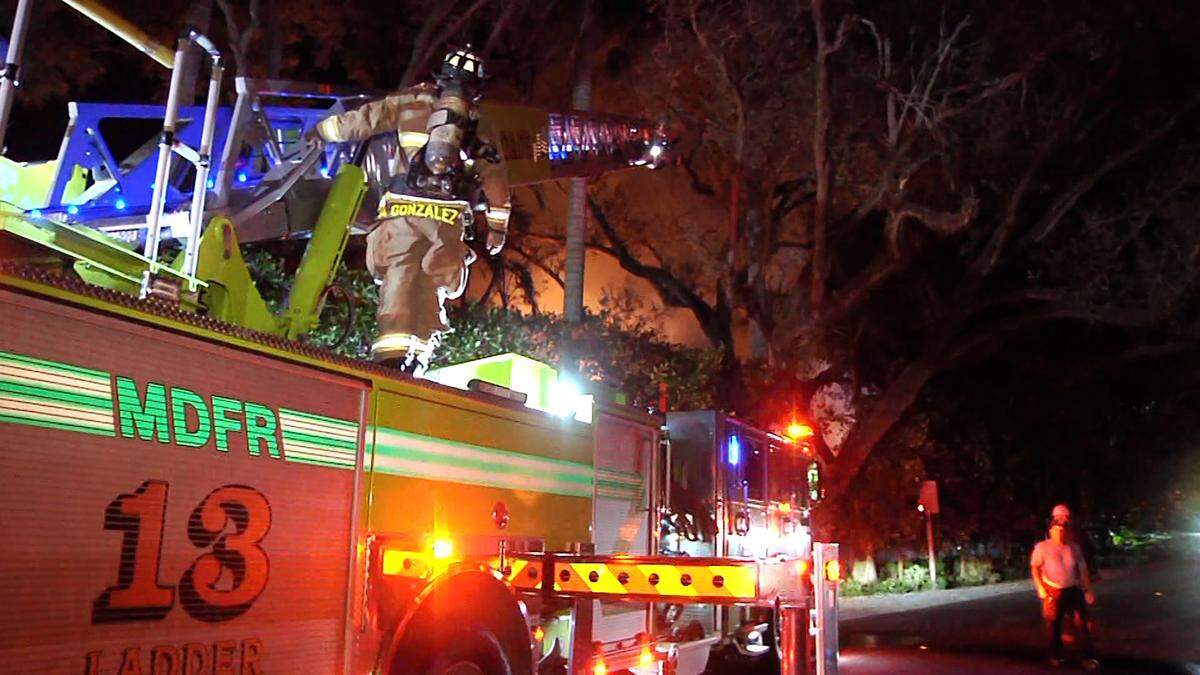 Miami-Dade Fire Rescue crews battle a blaze early Thursday at the home of Miami Heat coach Erik Spoelstra near Ponce and Davis roads in South Miami-Dade.
