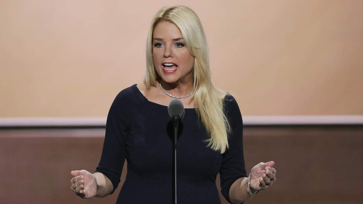 Florida Attorney General Pam Bondi has had trouble finding a law firm to take on the opioid industry. Some blame a state law that caps the fees for lawyers she hires.