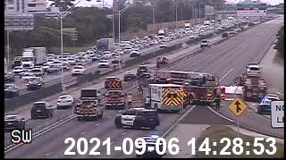 BSO Fire Rescue works on the car fire near the Southwest 10th Street exit of I-95