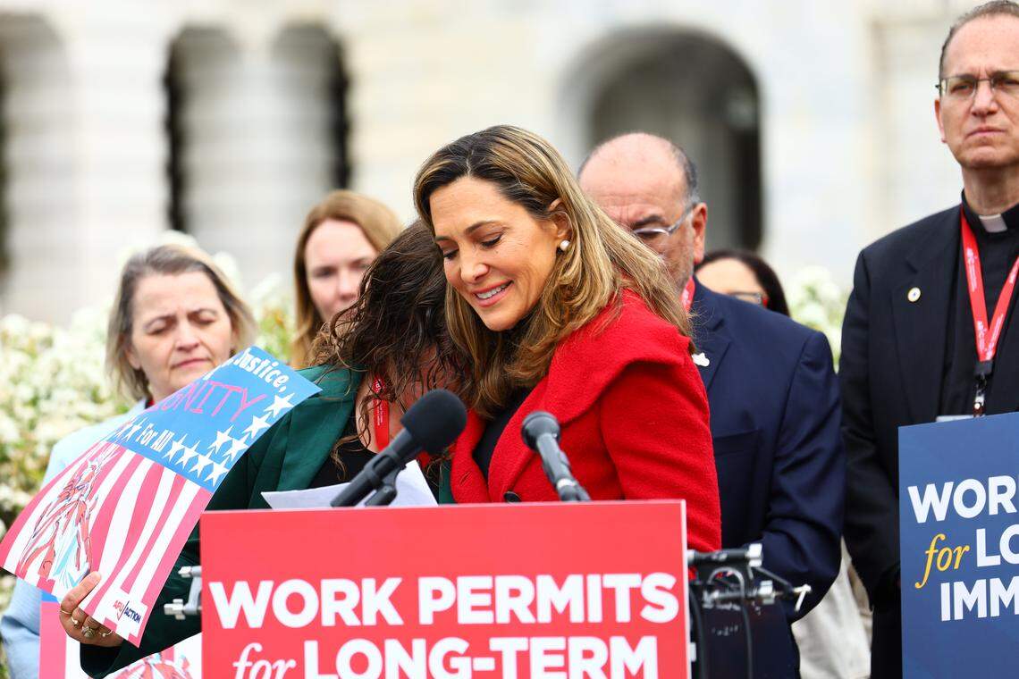 Agela Della Valle hugs U.S. Rep. Maria Salazar, who sponsors the Dignity Act, which Angela says would help mixed-status families like hers find a legal pathway to remain in the United States.