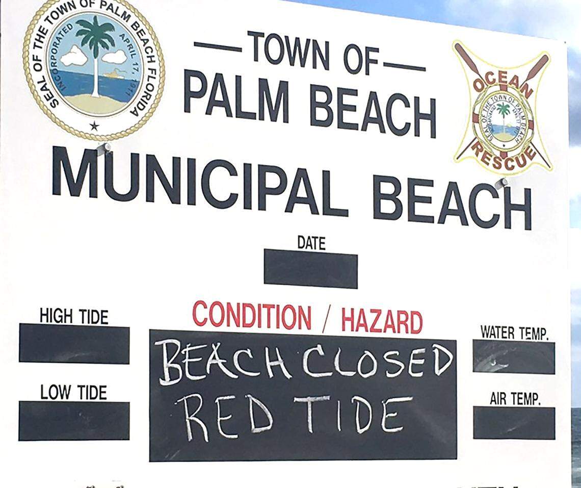 The sign at the Town of Palm Beach’s Midtown Beach shows it’s closed, due to possible red tide.