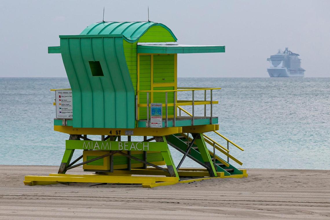 A cruise ship can be seen out in the water near Miami Beach, Florida on Wednesday, April 1, 2020. Concerns over COVID-19 have continued to increase all across Miami, causing business closures, unemployment and economic struggles.