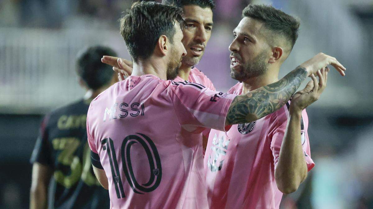 Inter Miami forward Lionel Messi (10) celebrates his score with forward Luis Suárez (9) and defender Jordi Alba (18), at right, against Atlanta United during the second half at Chase Stadium, Fort Lauderdale, FL, on Saturday, October 11, 2025.