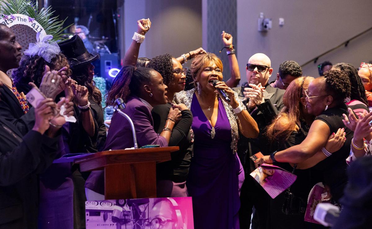 Maryel Epps sings ‘Purple Rain’ during Jill Tracey’s funeral service at Antioch Missionary Baptist Church.