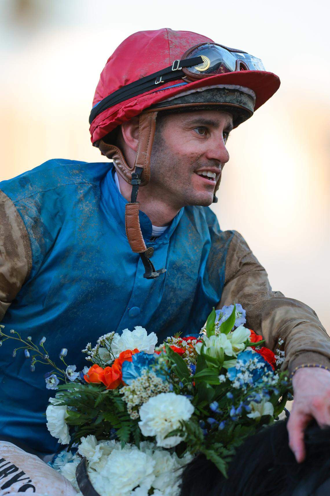Jockey Flavien Prat celebrates after ridding Commandment (4) to a victory during the 75th Curlin Florida Derby race at Gulfstream Park on March 28, 2026, in Hallandale, Florida.