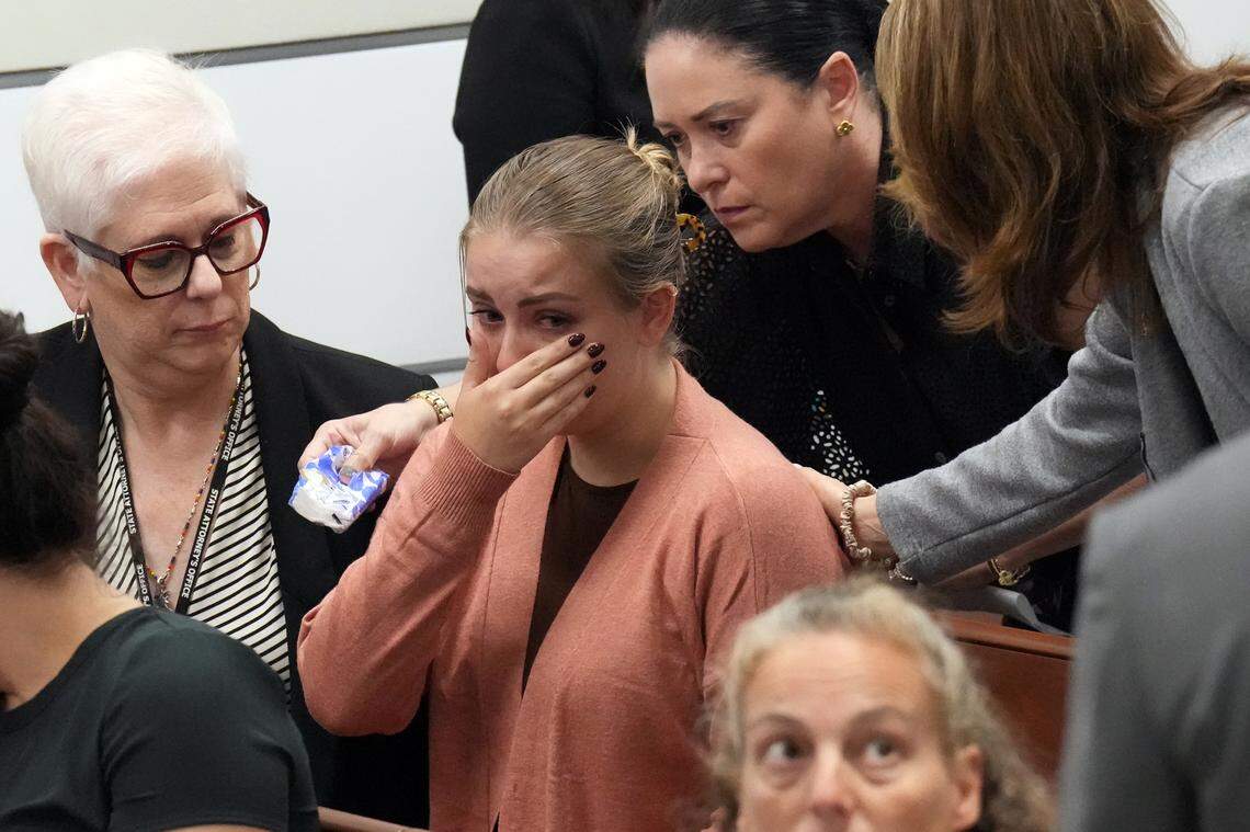 Meghan Petty is comforted as she takes a break from giving her victim impact statement during the sentencing hearing for Marjory Stoneman Douglas High School shooter Nikolas Cruz at the Broward County Courthouse in Fort Lauderdale on Monday, Nov. 1, 2022. Petty’s sister, Alaina, was killed in the 2018 shootings. Cruz, who pleaded guilty to 17 counts of premeditated murder in the 2018 shootings, is the most lethal mass shooter to stand trial in the U.S.