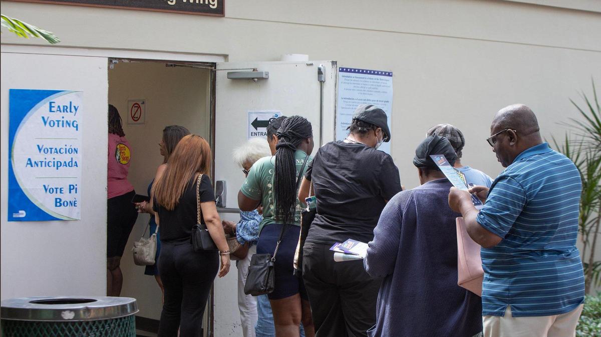 Residents of North Miami line up to vote early at the City of North Miami Public Library on Saturday October 26, 2024.