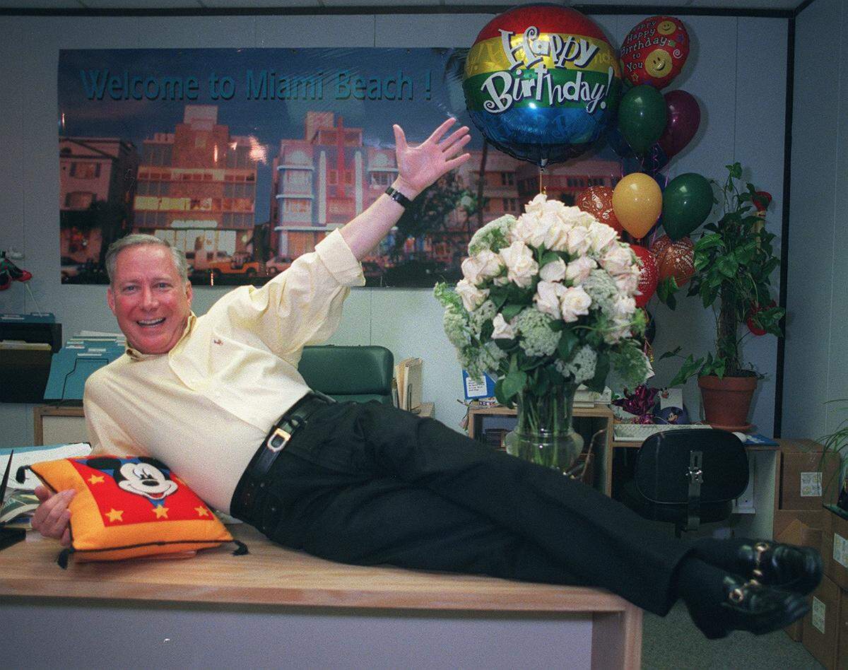 Michael Aller, Miami Beach’s tourism director, affectionately called “Mr. Miami Beach” by then Mayor Seymour Gelber, celebrated his 60th birthday on Sept. 3, 1999, in his office with some of the many gifts he received. Aller loved Mickey Mouse.