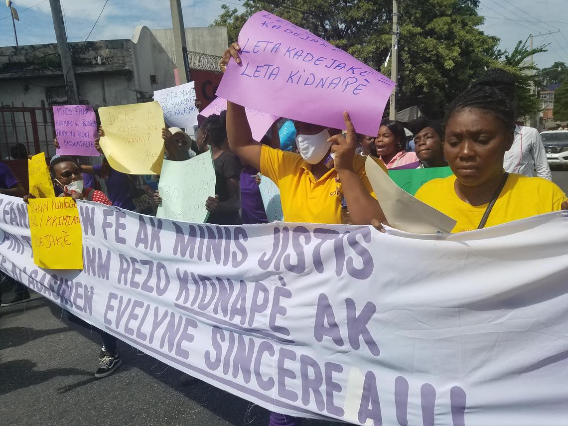 On Nov. 6, 2020, feminists with the group SOFA in Port-au-Prince, Haiti, protest the killing of high school student Evelyne Sincère, and demand that the ministry of women’s affairs speak up.