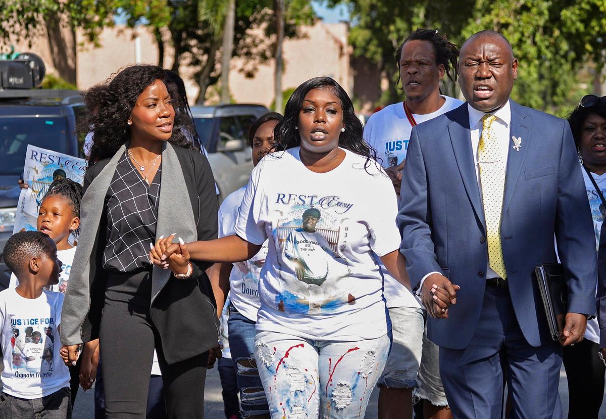 Civil rights attorney Benjamin Crump, right, along with Tequila Waters, the mother of Damain Martin, center, and attorney Sue-Ann Robinson, left, chant “Justice for Damain.” Damain Martin, 16, was chased by Sunrise police in March and died after jumping into a canal. The family and the two attorneys, along with the Broward chapters of the NAACP and Black Lives Matter. held a press conference Thursday, Jan. 2, 2020, saying they would sue the Sunrise police department over Damain’s death.