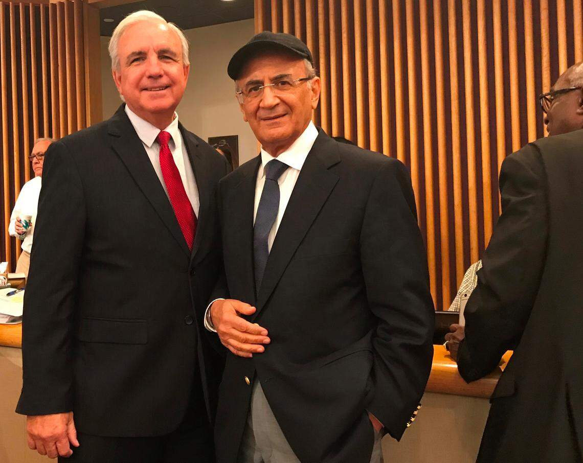Miami-Dade Mayor Carlos Gimenez, left, and Triple Five head Eskandar Ghermezian pose before the county commission voted to approve Triple Five's American Dream Miami project in Northwest Miami-Dade. The two negotiated a land deal in 2015 that allowed the developer to pursue a retail theme park that would be the largest mall in America.