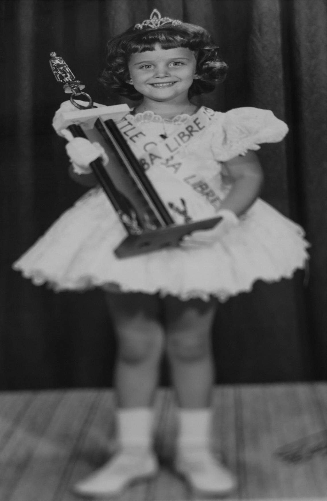 Little Miss Free Cuba, María de los Angeles Fonte, 5, in August 1965 in a newspaper published by Cuban Refugee Center, in the Freedom Tower. María de los Angeles was the first runner-up in Little Miss Universe.