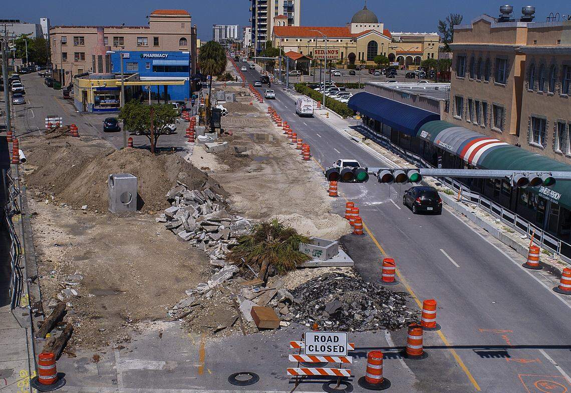 View of the intersection of 12th Avenue and West Flagler Street blocked with barricades, debris, idle equipment, etc., as construction along West Flagler Street drags on and on, taking small businesses down with it.