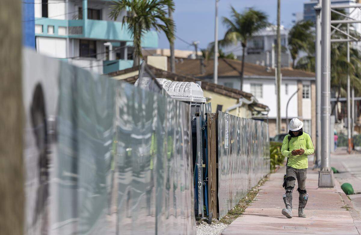 A worker can be seen at a construction development for PALMA Miami Beach Residences in North Miami Beach on Tuesday, May 5, 2026, in Miami Beach, Fla.