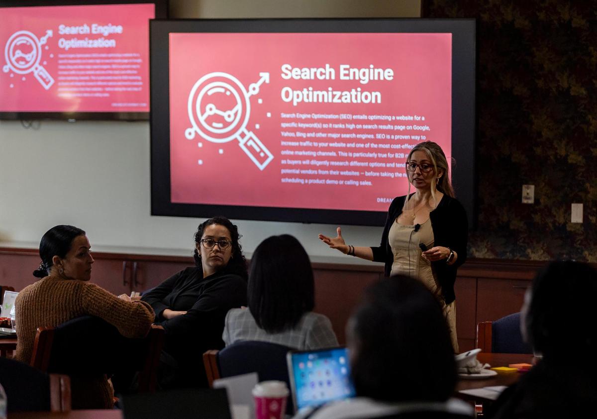 Mari Naranjo, chief dream officer with DreamCatcher Marketing, speaks during a childcare business seminar at Nova Southeastern University on Saturday, Nov. 16, 2024, in Davie, Florida. The seminar aimed to teach participants how to start and improve their childcare businesses operations.
