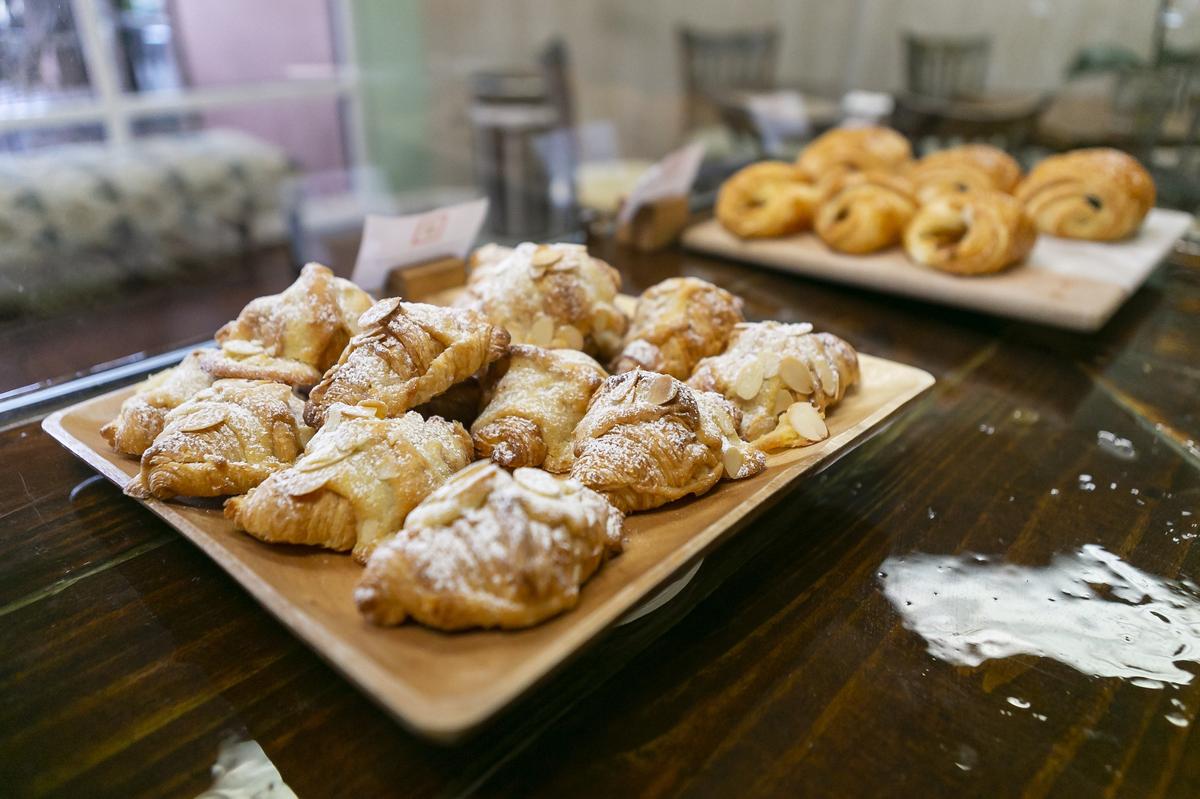 Fresh baked almond croissants are on display at Our Grounds, which partners with local bakeries to provide treats to pair with Fort Lauderdale’s Argyle Coffee.