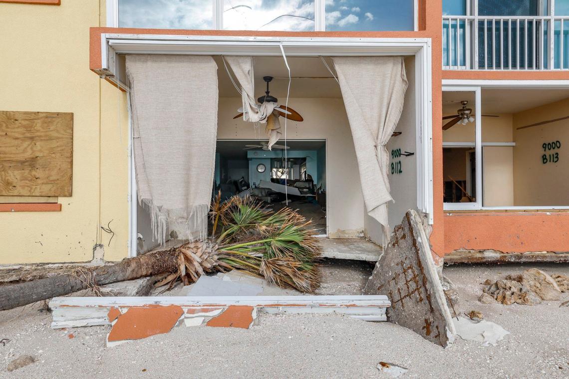 Storm surge and wind from hurricanes Helene and Milton caused beach erosion and damaged condos at Fisherman’s Cove beach front condominium rentals on Siesta Key, Florida on Thursday, October 10, 2024.