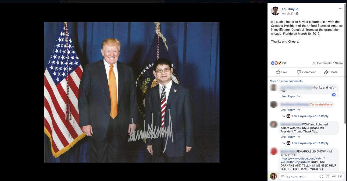 Xinyue ‘Daniel’ Lou is pictured with President Donald Trump at a March 10, 2019, fundraiser at Mar-a-Lago.