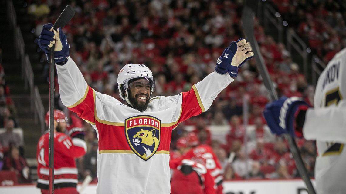 The Florida Panthers’ Anthony Duclair (10) celebrates after a goal by teammate Carter Verhaeghe (23) to take a 2-1 lead over the Carolina Hurricanes in the second period during Game 1 of the NHL Eastern Conference finals on Thursday, May 18, 2023 at PNC Arena in Raleigh, N. C.