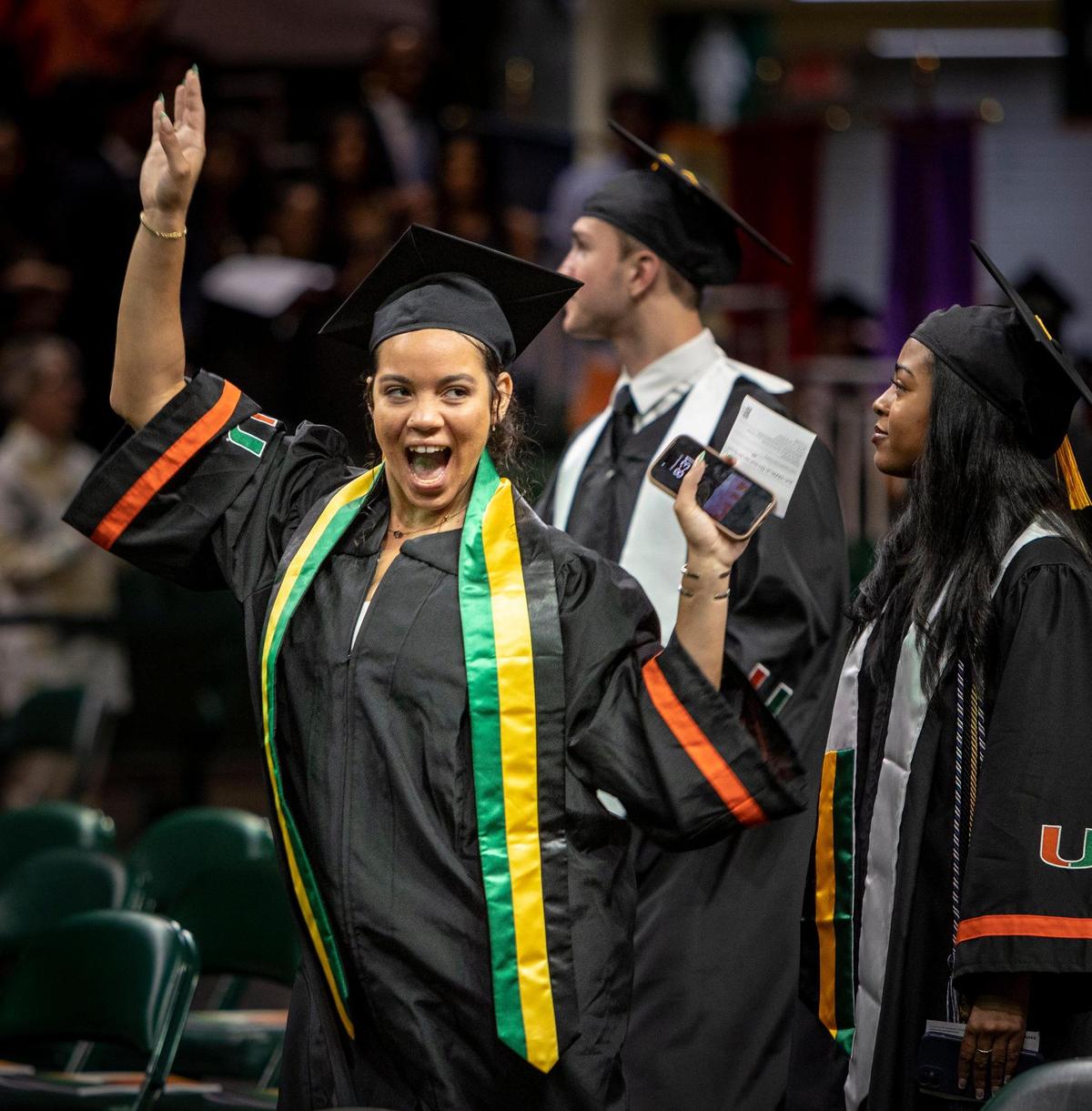 Savannah Hussey, a graduate, dances her way into the University of Miami’s spring commencement ceremony.