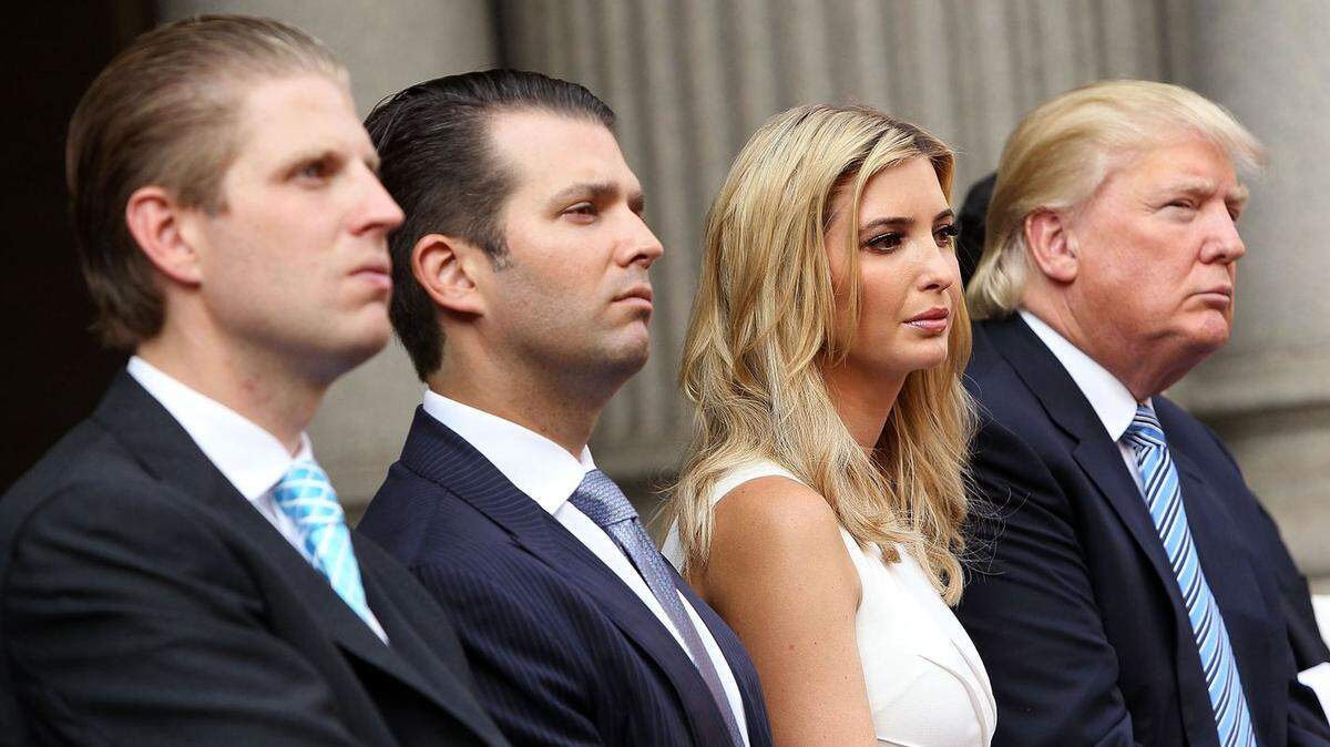 President Trump with three of his adult children.