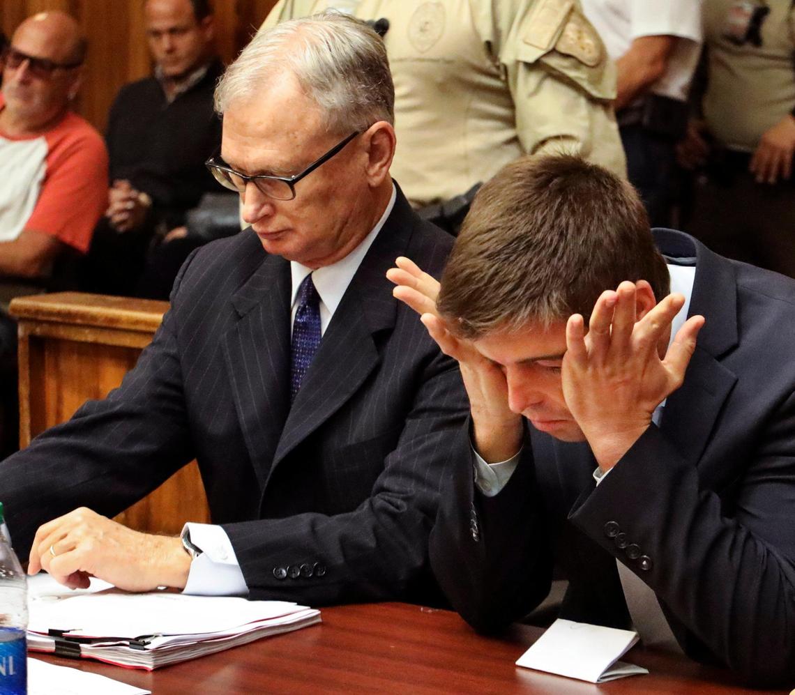 Joseph Franco, right, reacts to the statements by Amir Pelleg’s mother while sitting next to his attorney, Robert Reiff, on Wednesday after pleading guilty.