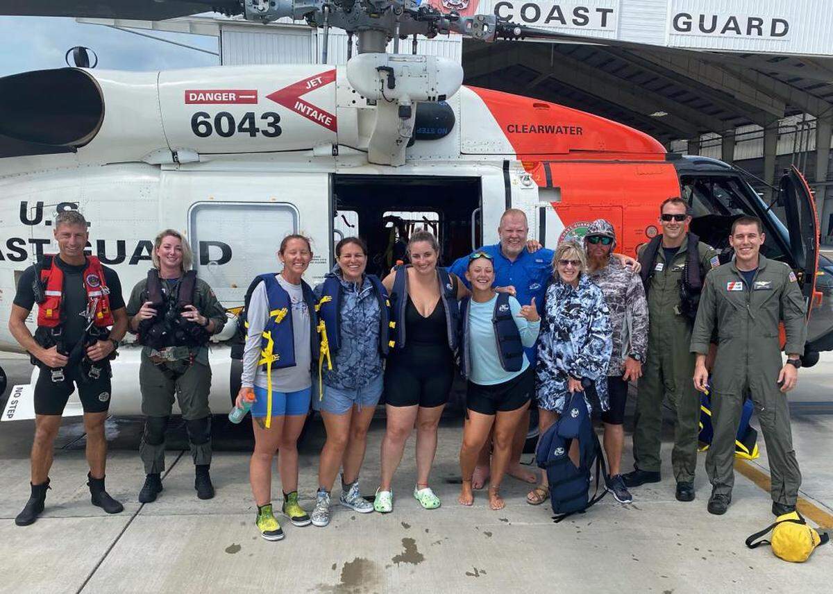 A U.S. Coast Guard Air Station Clearwater MH-60 Jayhawk helicopter aircrew rescued seven people after their 39-foot personal vessel was struck by lightning 100 offshore of Clearwater, Florida on June 25, 2022. The five women and two men were returned without medical concerns to the air station where family greeted them.