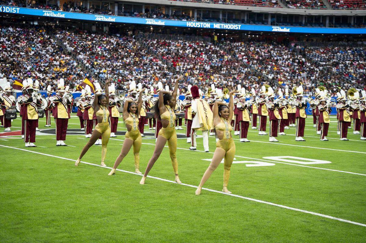 Bethune-Cookman University’s 14 Karat Gold Dancers perform as part of the Marching Wildcats during the 2024 National Battle of the Bands in Houston.
