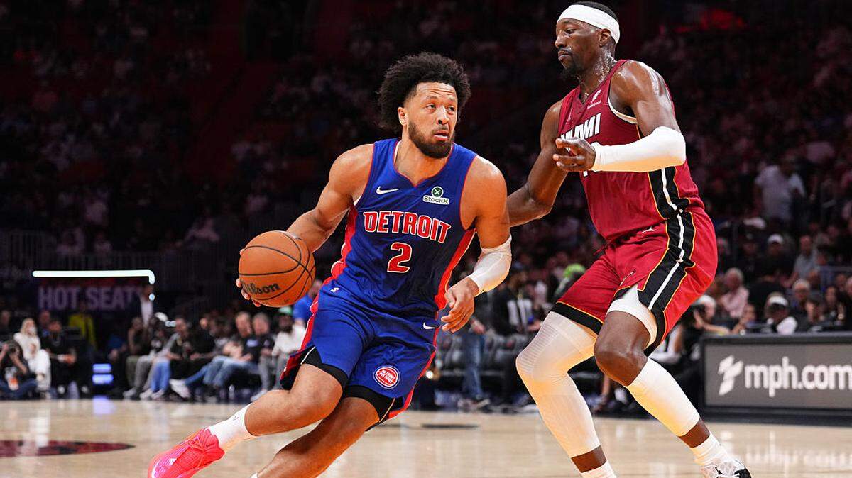 Cade Cunningham #2 of the Detroit Pistons dribbles the ball against Bam Adebayo #13 of the Miami Heat during the first quarter at Kaseya Center on March 08, 2026 in Miami.