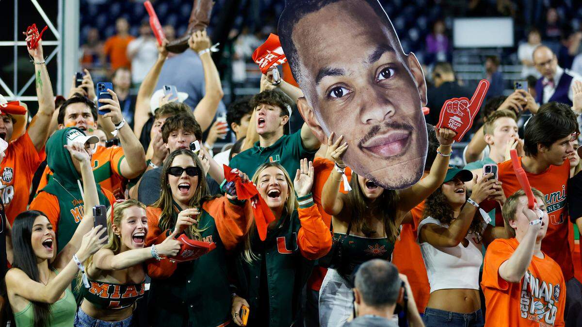 Miami Hurricanes show their support before the start of the Men’s Basketball Championship National Semifinal against the Connecticut Huskies at NRG Stadium in Houston, Texas on Saturday, April 1, 2003.