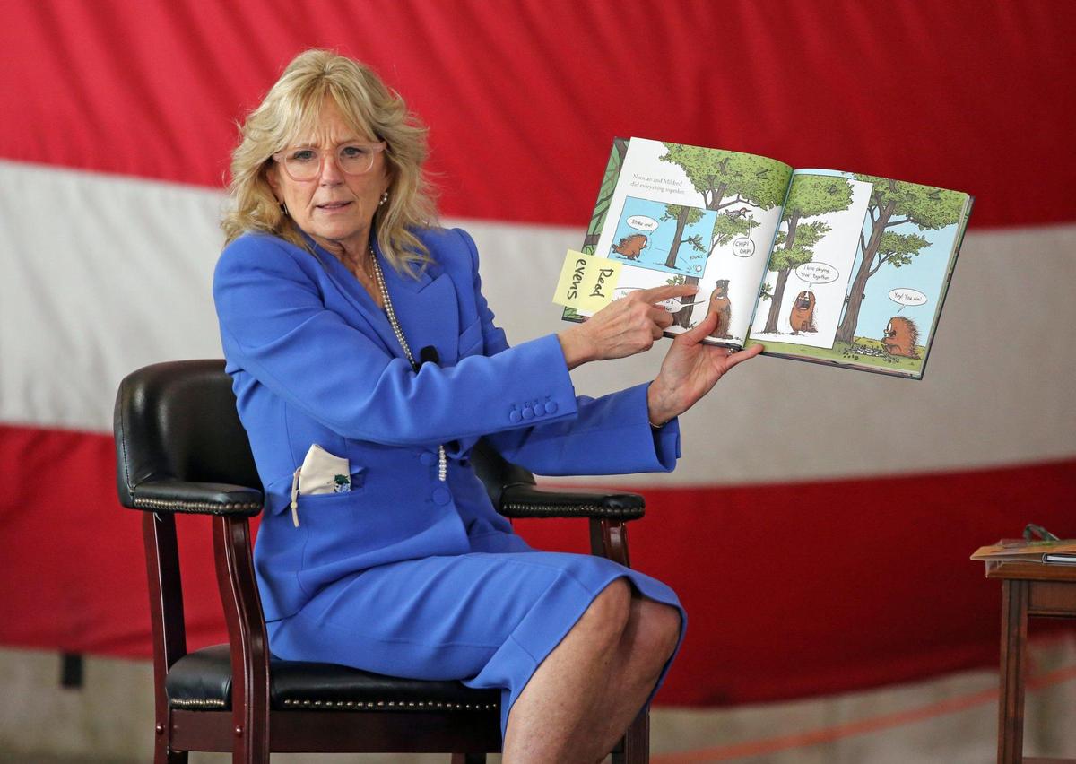 First lady Jill Biden reads ‘Norman Didn’t Do It!: (Yes, He Did.),’ by author Ryan T. Higgins at the U.S. Coast Guard Air Station Miami in Opa-locka on Friday, Feb. 18, 2022. The book reading event in partnership with Disney and Blue Star Families is an effort to bring ‘Blue Star Books’ to military families, as part of the White House’s Joining Forces initiative.