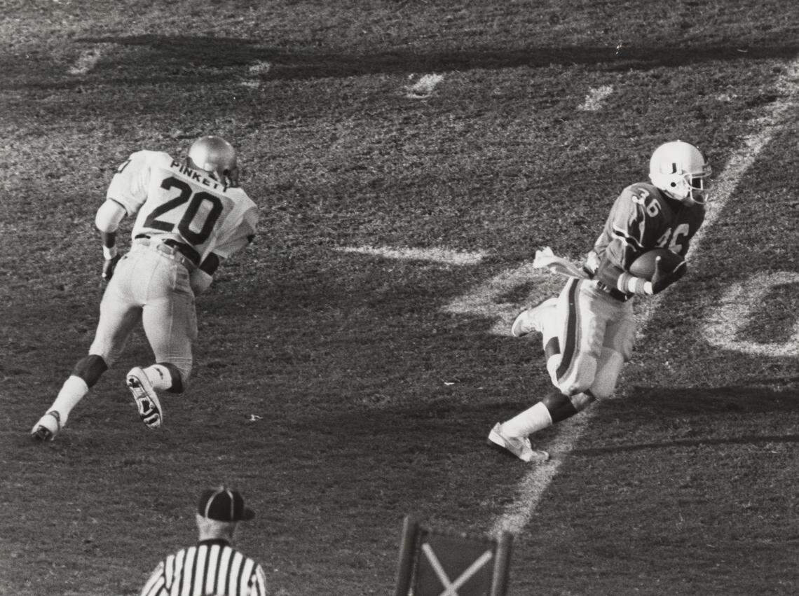 In 1985, UM's Bennie Blades takes off on a 61-yard interception return for a touchdown after stepping in front of Notre Dame's Allen Pinkett.