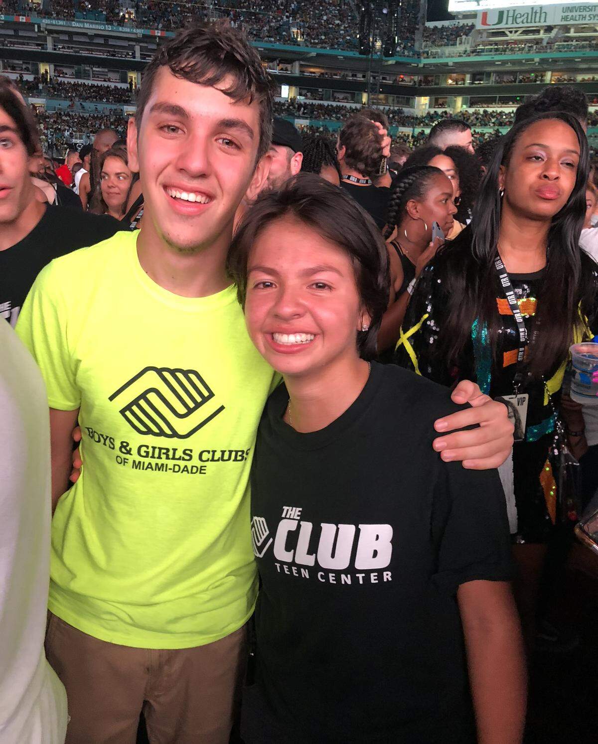 Jonathon Burgos, 17, and Emily Garay, 17, celebrate after hearing DJ Khaled’s presentation of $100,000 college scholarships to each of them at the Beyoncé and Jay Z concert at Hard Rock Stadium in Miami Gardens on Aug. 31, 2018.