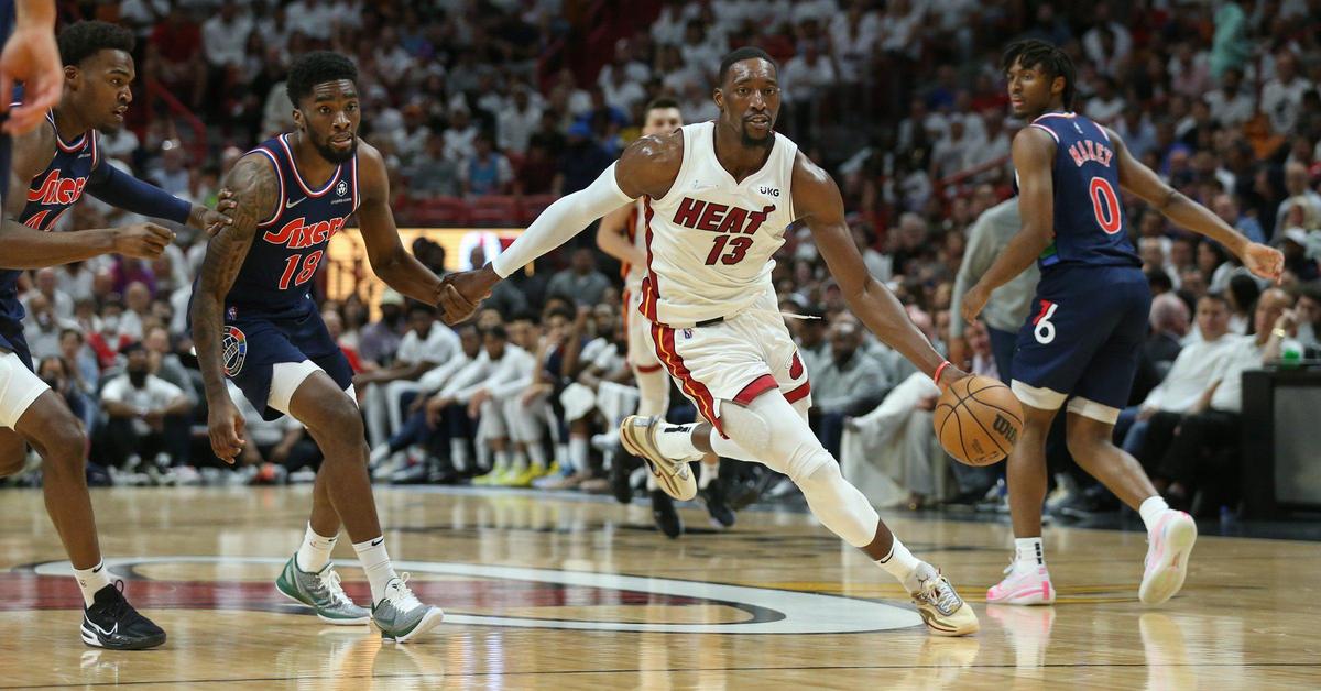 Miami Heat center Bam Adebayo (13) drives to the basket as Philadelphia 76ers guard Shake Milton (18) defends in the first half during the NBA Playoffs: Round 2, Game 5 at FTX Arena in Miami on Tuesday, May 10, 2022.