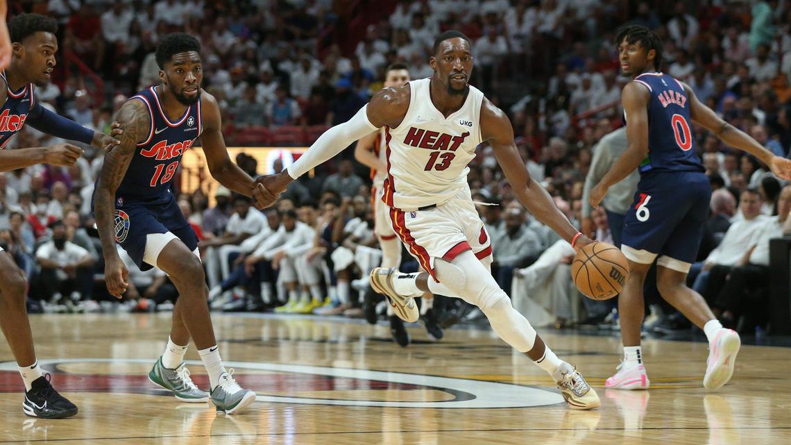 Miami Heat center Bam Adebayo (13) drives to the basket as Philadelphia 76ers guard Shake Milton (18) defends in the first half during the NBA Playoffs: Round 2, Game 5 at the FTX Arena in Miami on Tuesday, May 10, 2022.