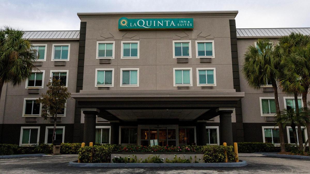 An exterior shot of the La Quinta hotel that will be converted into affordable apartments for the formerly homeless in Cutler Bay, Florida, on Wednesday, Nov. 29, 2023.